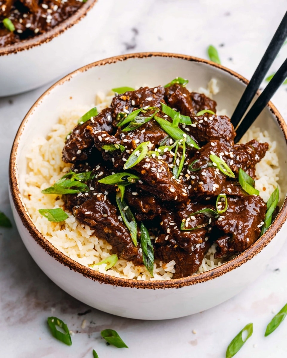 The image shows a close-up of cooked sliced mushrooms in a pot, covered with a dark, glossy sauce that makes them look shiny and rich. The mushrooms are thinly sliced and scattered throughout the pot, with bits of green herbs and sprinkled white sesame seeds on top, adding a touch of color and texture. A wooden spoon is scooping some of the mushrooms from the pot, with a woman's hand holding the spoon. The background is a white marbled texture, giving a clean and bright look. Photo taken with an iphone --ar 4:5 --v 7
