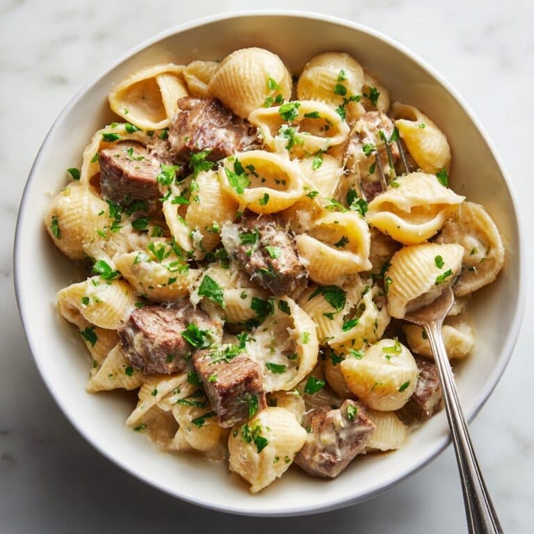 Steak Bites and Shell Pasta in Garlic Butter Alfredo Sauce Recipe
