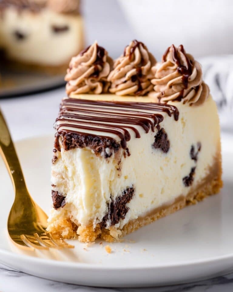 Chocolate Chip Cheesecake with Chocolate Whipped Cream and Cocoa Drizzle Recipe