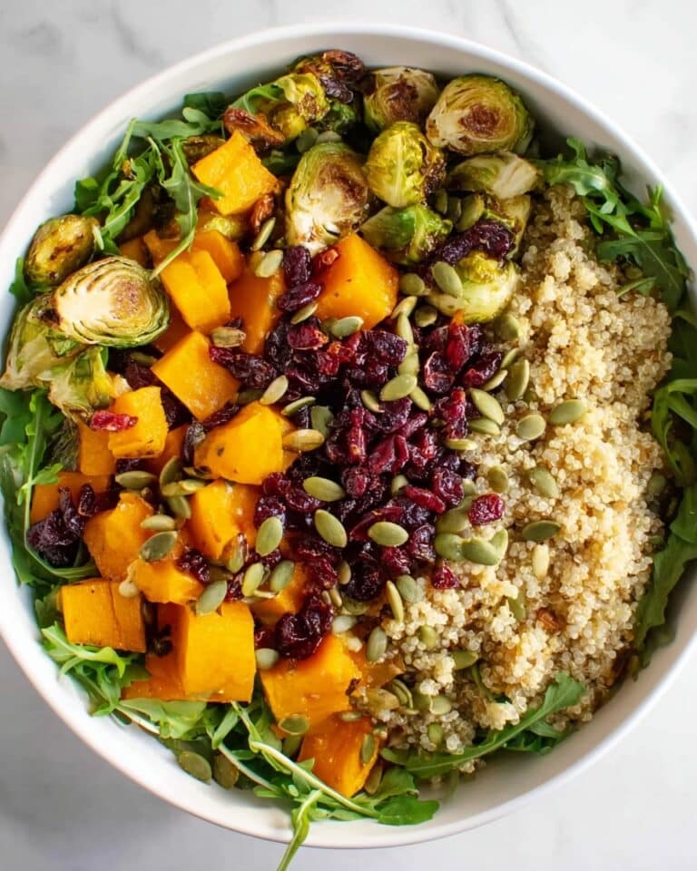 Arugula Quinoa Salad with Roasted Butternut Squash and Cranberry-Tahini Dressing Recipe