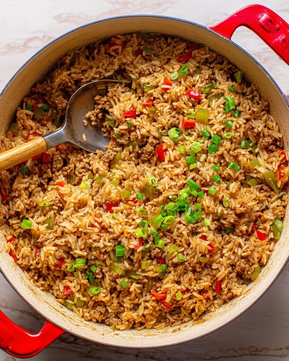 The image shows a close-up of a large white pot with red handles filled with cooked rice mixed with ground meat, small pieces of green celery, red bell peppers, and chopped green onions sprinkled on top. The rice is light brown, and the meat is finely crumbled and evenly spread throughout. A silver spoon rests inside the pot, scooping a portion of the rice mixture. The pot sits on a white marbled surface. photo taken with an iphone --ar 4:5 --v 7
